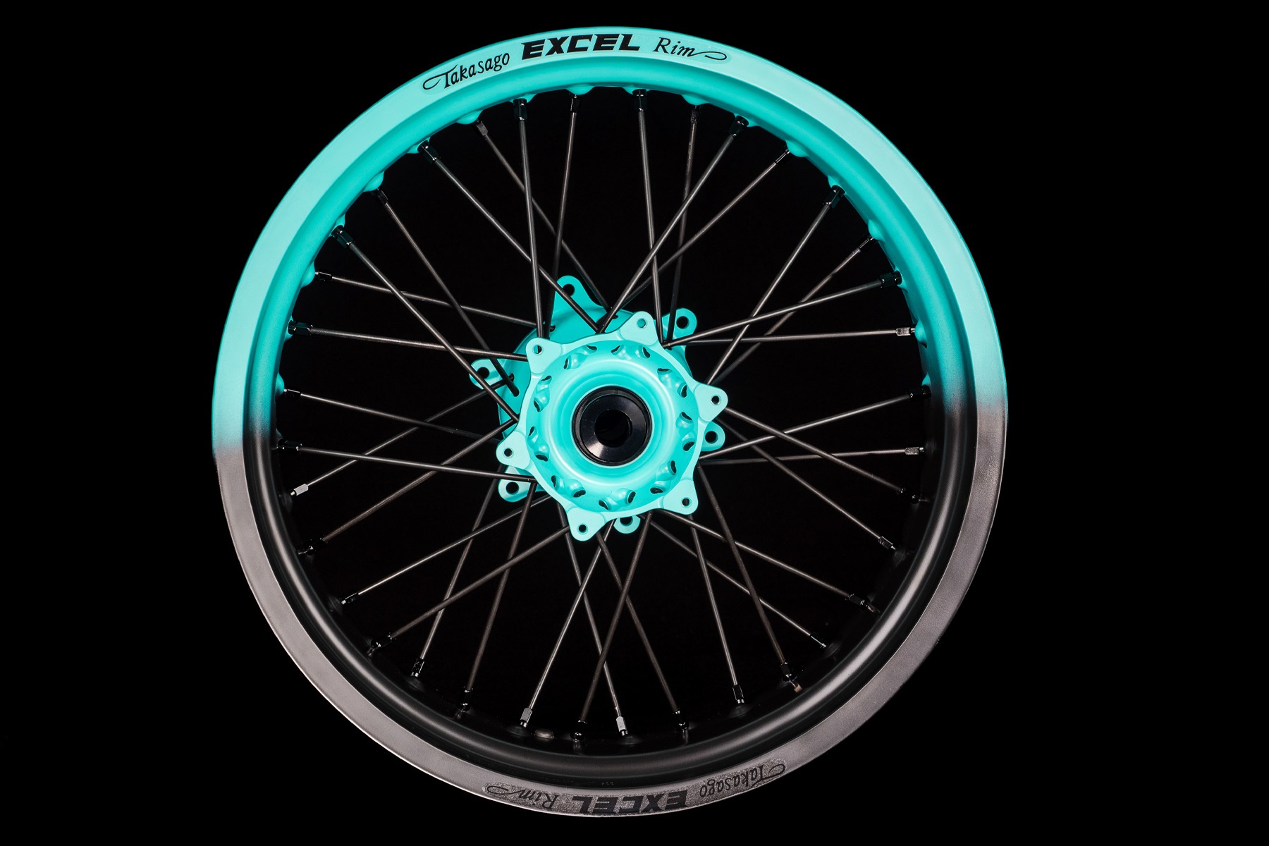 Supermoto Radsatz von Haan Wheels mit Cerakote Beschichtung in teal-schwarz-1 Supermoto Radsatz von Haan Wheels mit Cerakote Beschichtung in Wunschfarbe – Bild 1